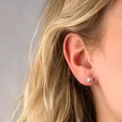 6 mm rosa perleøreringe i 9 karat guld