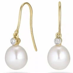 Ovale 7 - 8 mm aaa-graded ferskvandsperle diamantøreringe i 14 karat guld med diamanter
