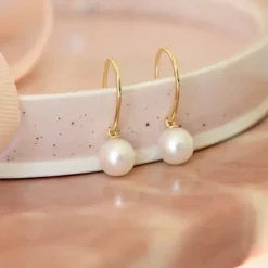 Perle øreringe i 9 karat guld