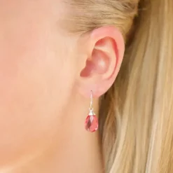 Øreringe i 9 karat guld med pink krystal